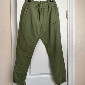 Nike Sport Pants Size L Olive Green Joggers with pockets and drawstrings EUC